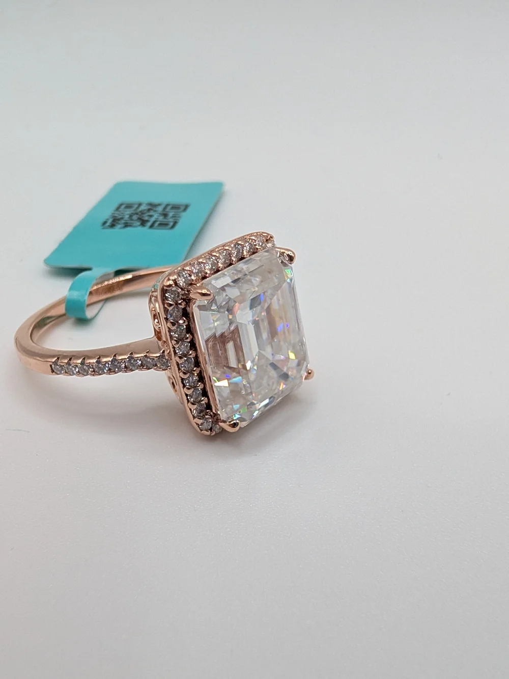 Rose Gold Halo Emerald-Cut Cubic Zirconia Engagement Ring